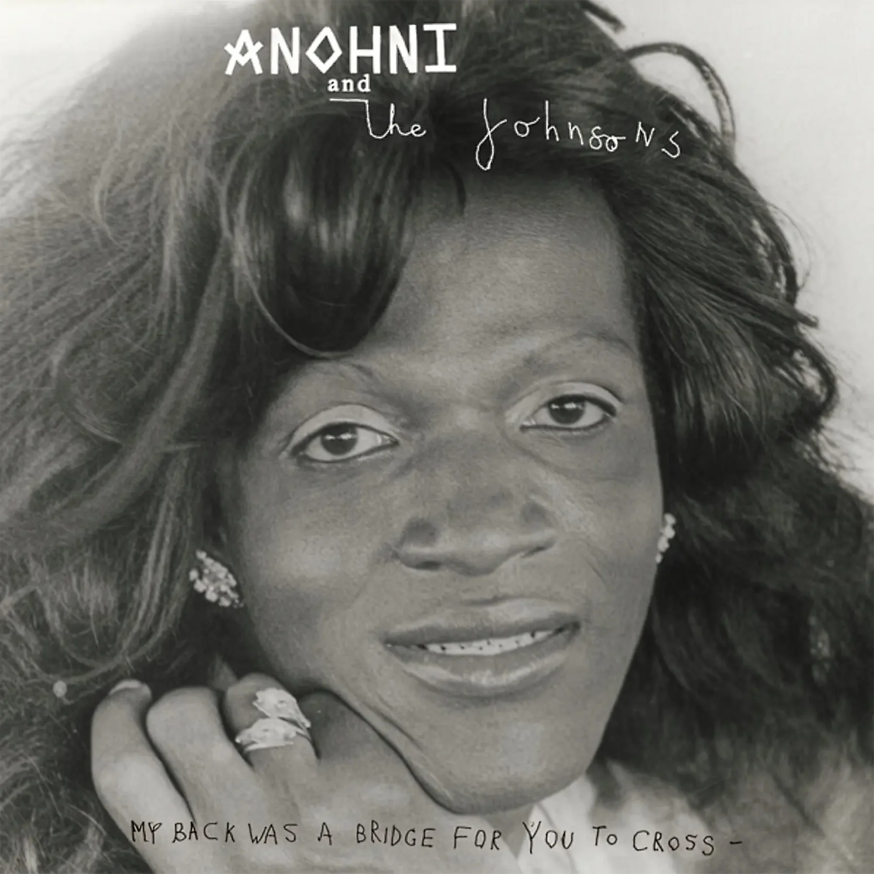Album cover with a black and white portrait of a woman, featuring the text 'Anohni and The Johnsons' and 'My back was a bridge for you to cross'.