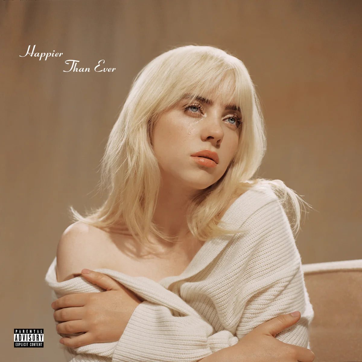 Album cover with a person wearing a white sweater against a beige background, featuring the text 'Happier Than Ever'.