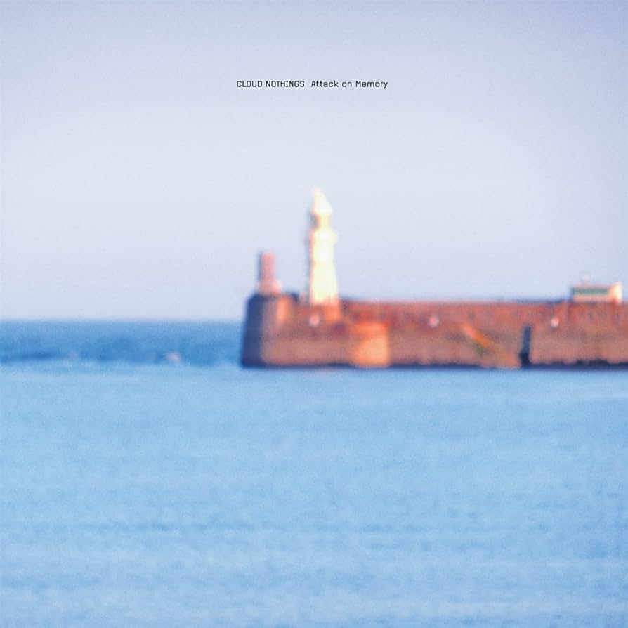 Sky blue vinyl edition of Attack On Memory by Cloud Nothings with clear flexi-discs and stark monochrome artwork reflecting raw indie rock energy.