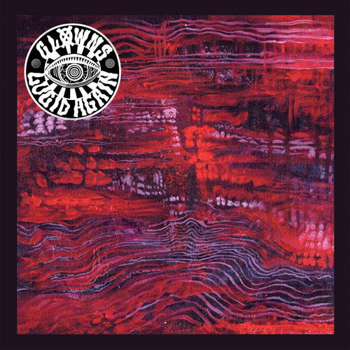Album cover with abstract red and black design and a logo in the top left corner.