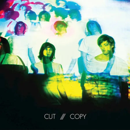 Album cover with a group of people in colorful, abstract lighting with 'Cut Copy' text.