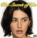 Limited edition yellow vinyl pressing of The Secret of Us by Gracie Abrams featuring the warm, close-up portrait cover art of Gracie smiling.