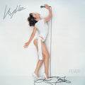 Album cover with a person in a white dress holding a microphone, text 'Vynlia' and 'Fever' on a light gray background.