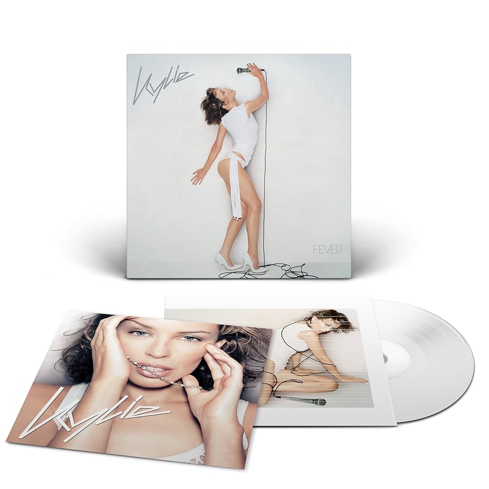Vinyl record set with cover featuring a woman in a white dress on a white background