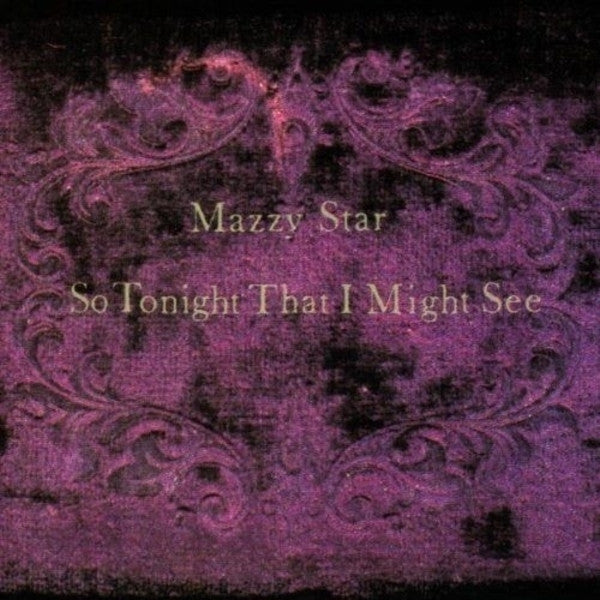 Limited RSD Essential violet smoke vinyl with purple and black splatter of So Tonight That I Might See by Mazzy Star featuring the iconic hazy blue portrait artwork.