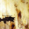 Nine Inch Nails The Downward Spiral CD edition in its signature cream-colored, heavily textured conceptual art cardboard slipcase cover.