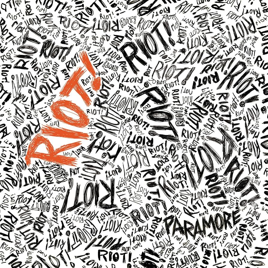 Vinyl LP edition of Riot! by Paramore featuring the iconic white and red typography album cover art.