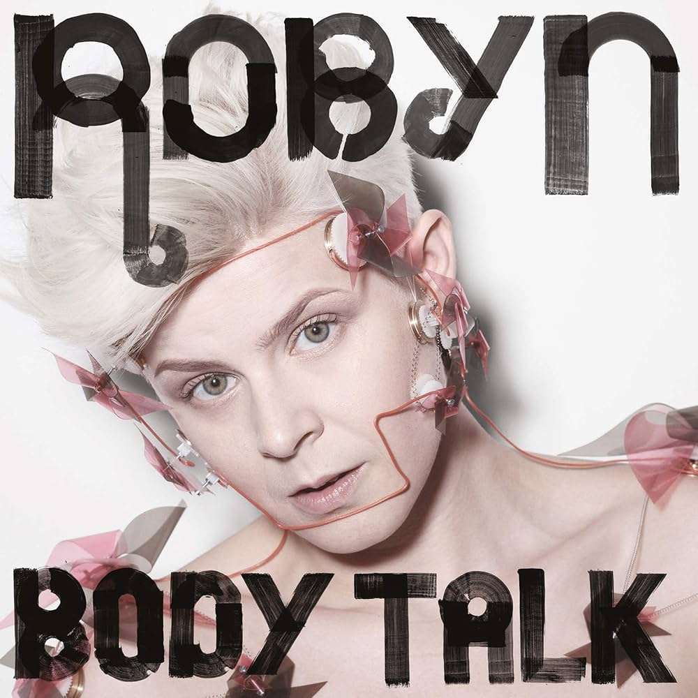 Album cover for 'Body Talk' by Robyn with a stylized portrait and text.
