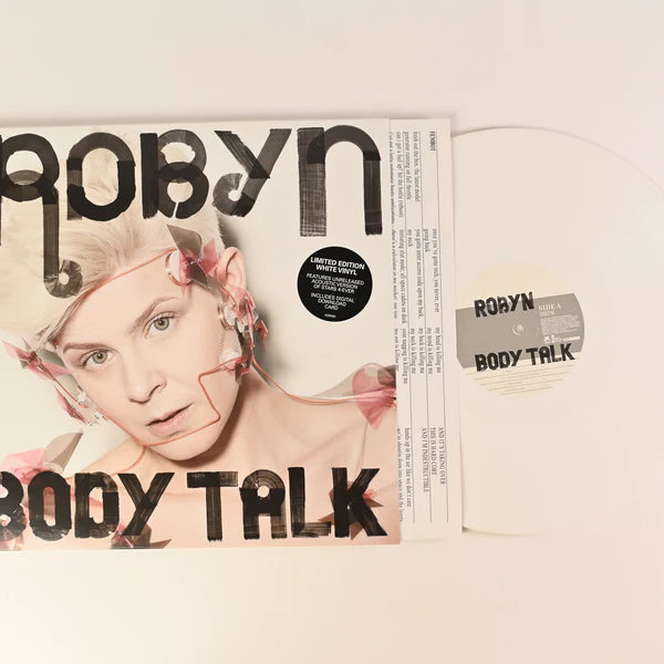 Vinyl record with 'Robyn Body Talk' cover on a light background