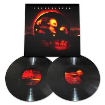 Vinyl records with a red and black cover featuring a fiery design.
