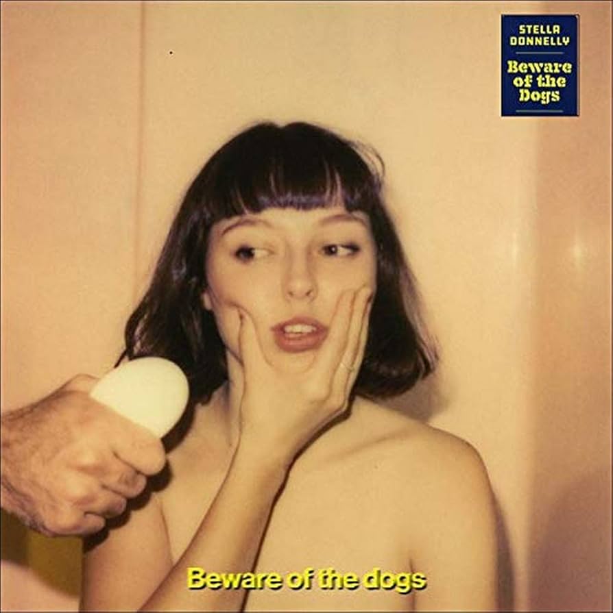 Vinyl album cover for Beware Of The Dogs by Stella Donnelly featuring colourful portrait artwork with playful yet understated indie aesthetics.