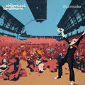 Album cover for Surrender by The Chemical Brothers featuring bold red artwork with abstract black shapes and white typography, reflecting the high-energy big beat electronic style of the late 1990s.