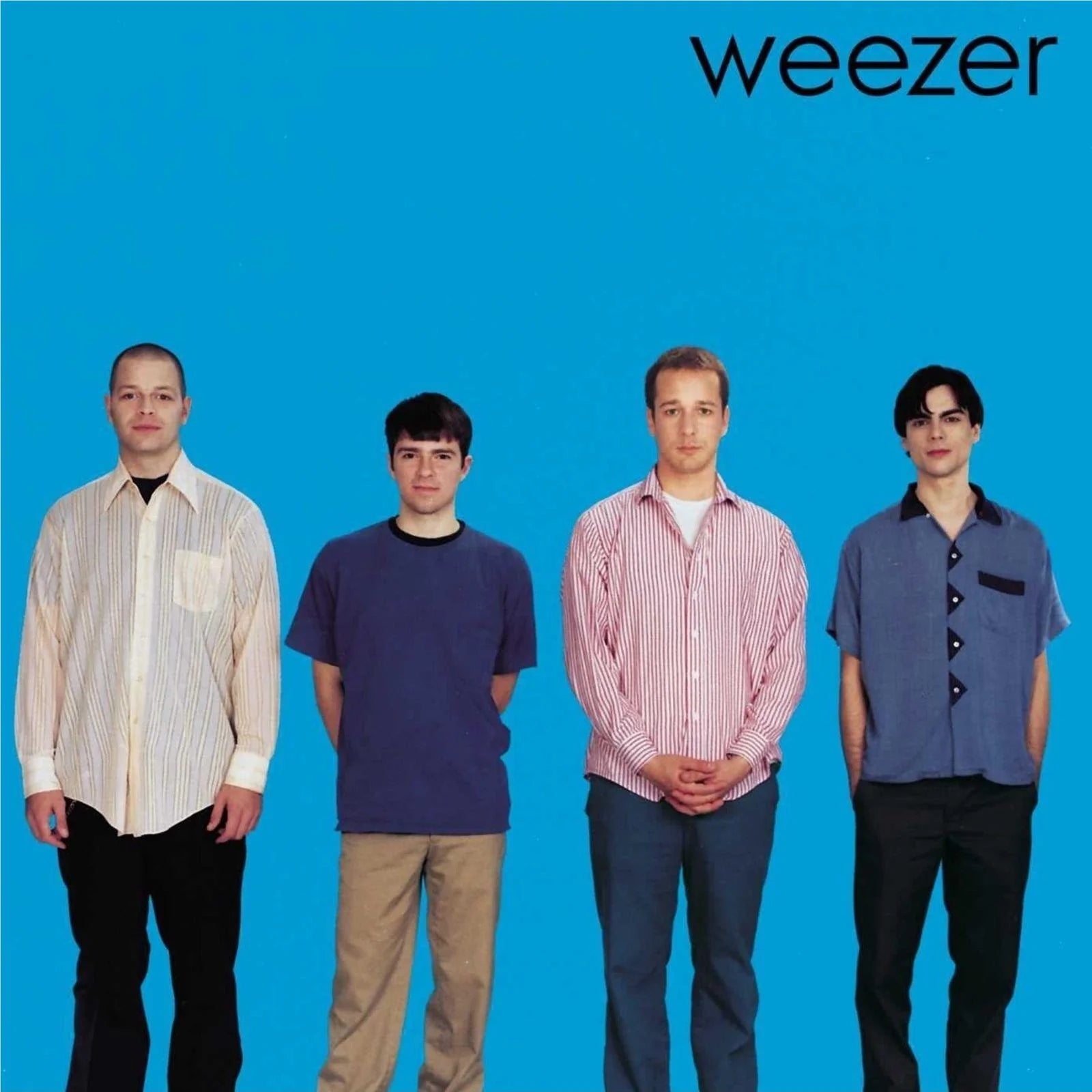 2016 EU remastered vinyl edition of Weezer's self-titled Blue Album featuring the iconic, stark blue background with the four band members standing in a line.